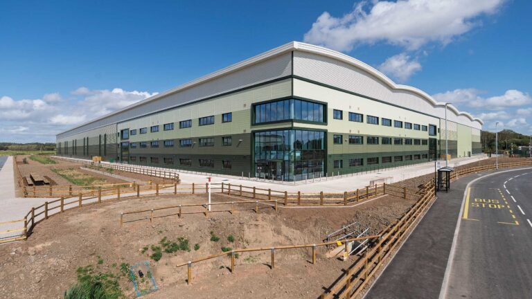 Office entrance, landscaping and bus stop